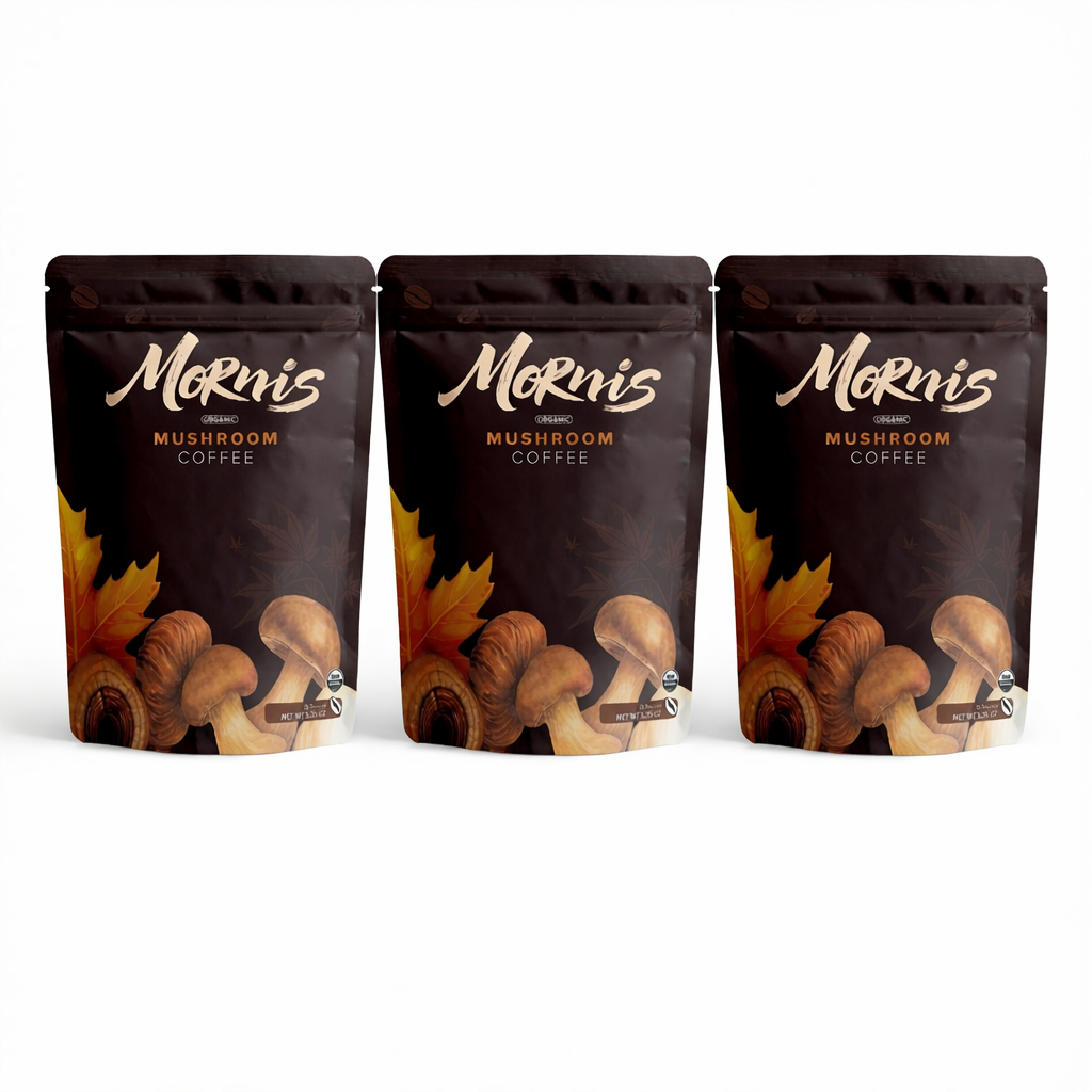 Three packages of  Mushroom Coffee on a white background
